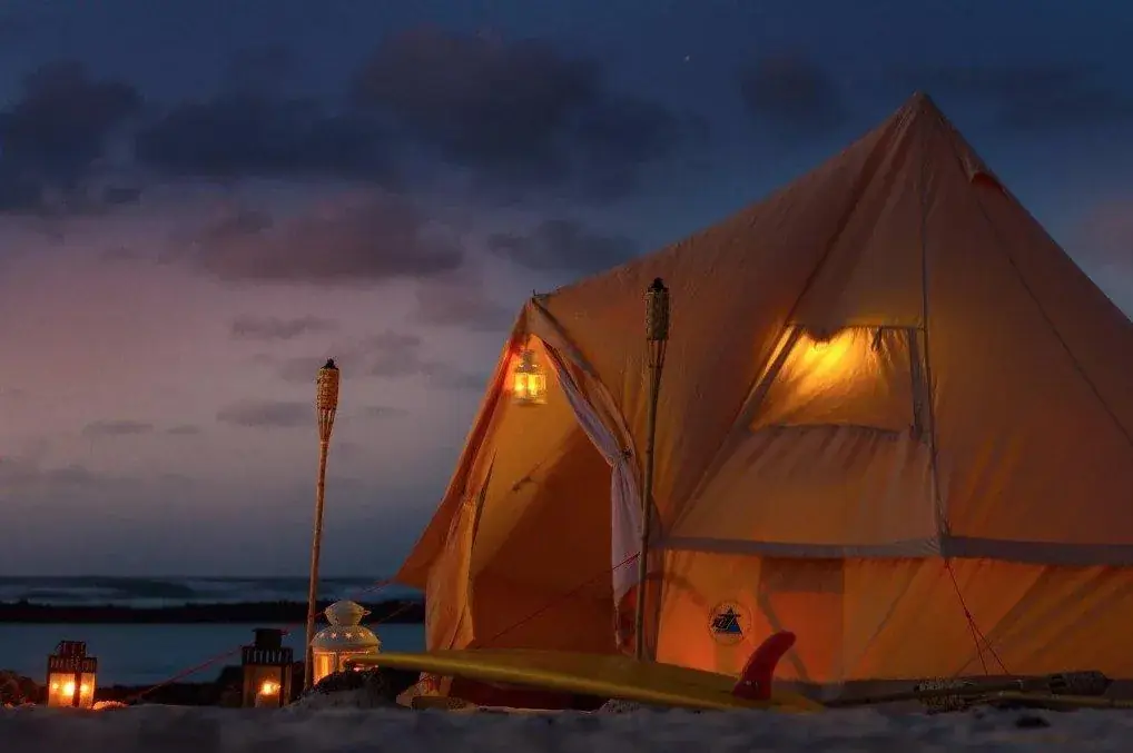 how to reduce accommodation expenses at surfing camps